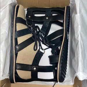 Brand new lace up Sorel sandals